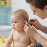 Kell-e és hogyan kell eltávolítani a fülzsírt a baba füléből?